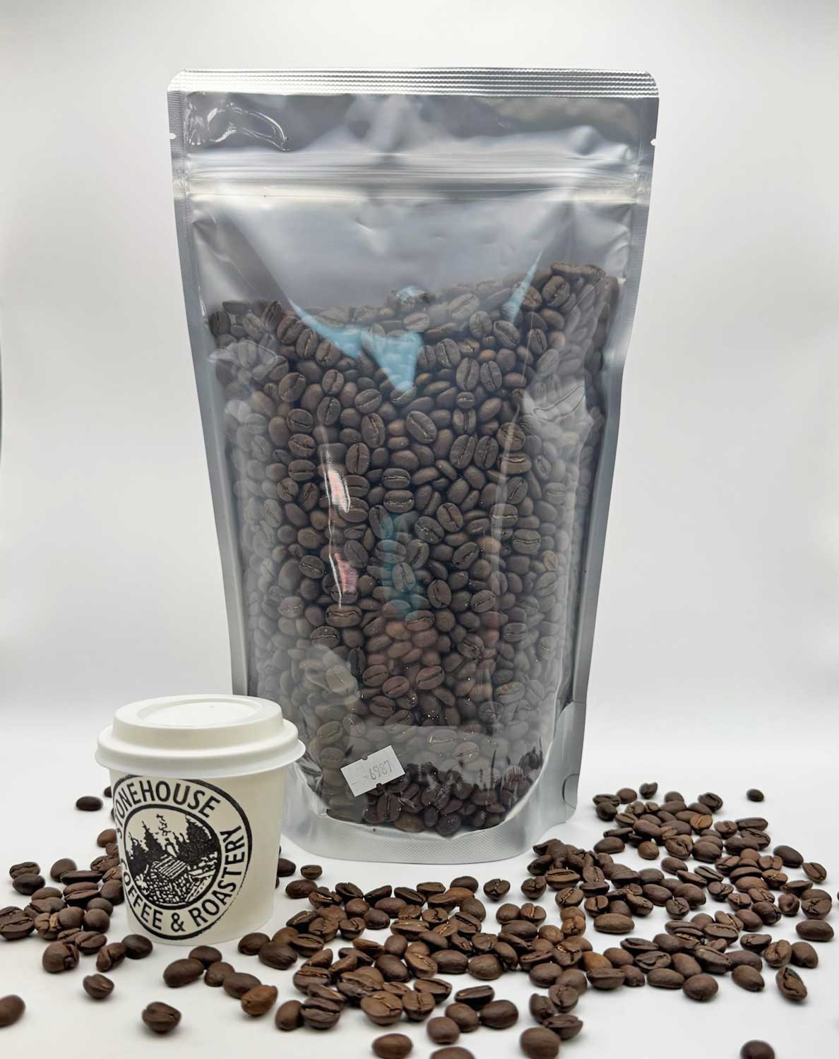 Back view of coffee beans bag with whole coffee beans